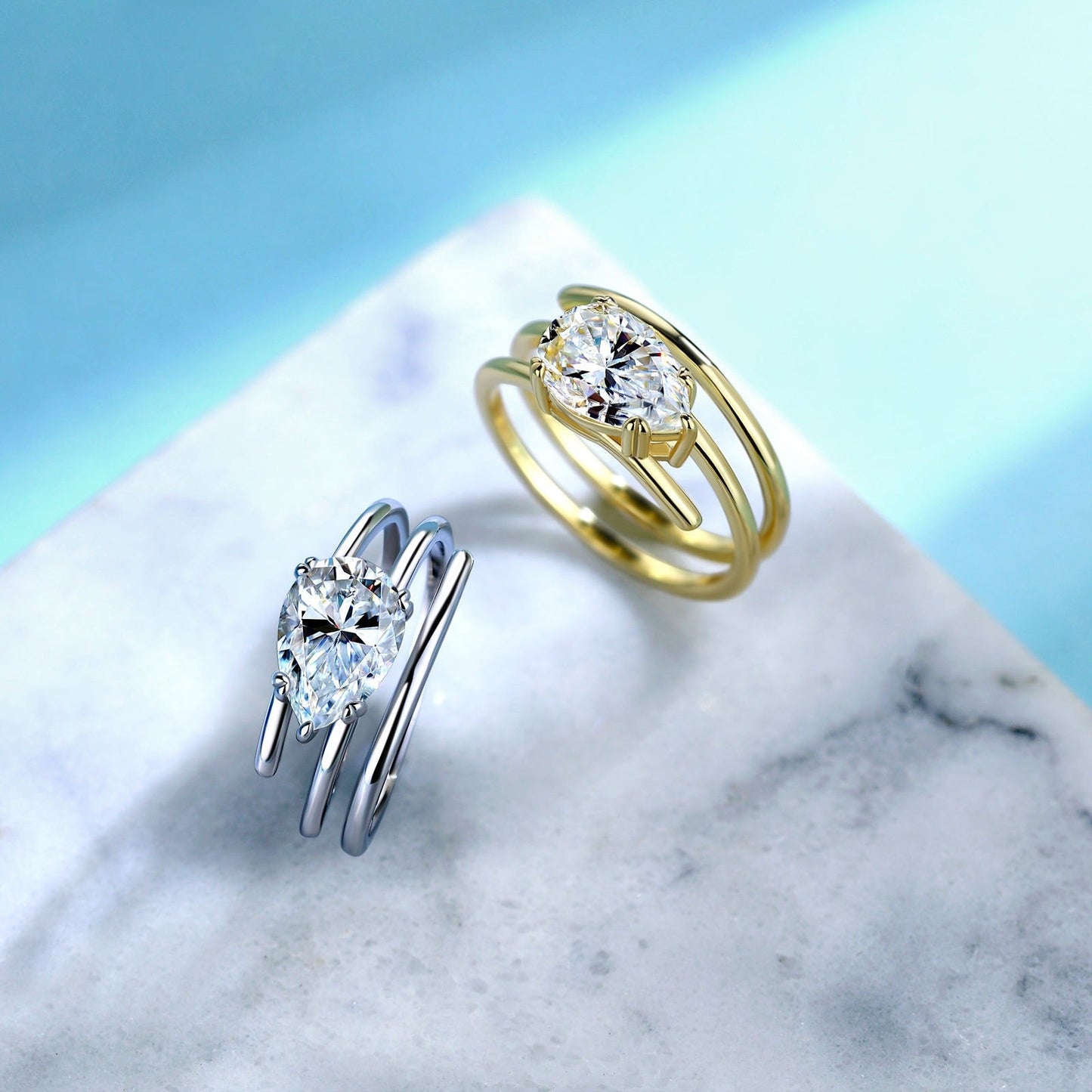 Pear Moissanite Ring - Gold and Silver